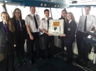 The Project Helios capsule is handed over on Ben-my-Chree’s bridge. Pictured from left are Claire Stevenson, Orlagh McKeeman, Chief Engineer Dean Ellis, Captain James Cavanagh, Mairead Gavin, Catherine Campbell and Chief Officer Simon Killey