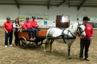 Isle of Man Steam Packet Company Marketing and Online Manager Renée Caley (second from left) with members of Manx Carriage Driving 4 Disabled and the charity’s new carriage