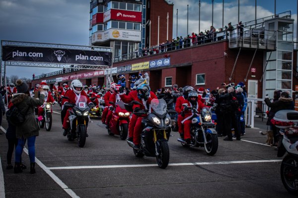 The calvacade leaving The Grandstand for the inaugural Santa on a Bike event in 2018. (photo credit - Mark Weir)
