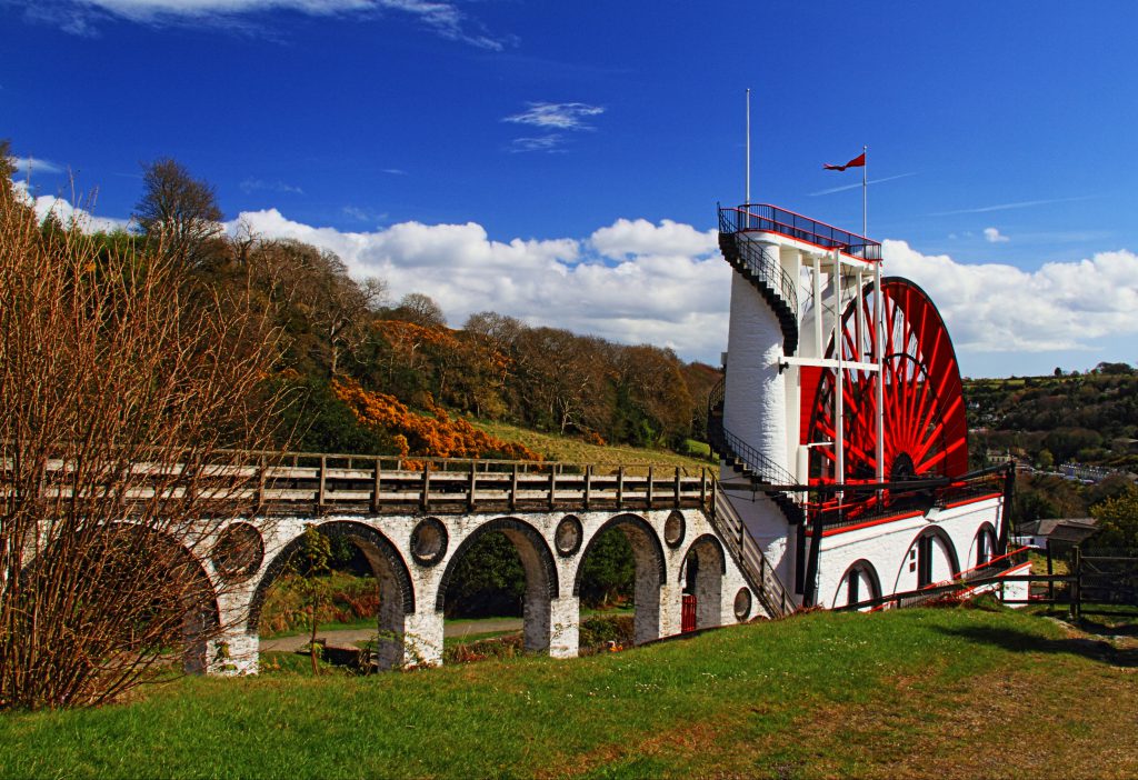 The sun is shining on the Laxey Wheel.  