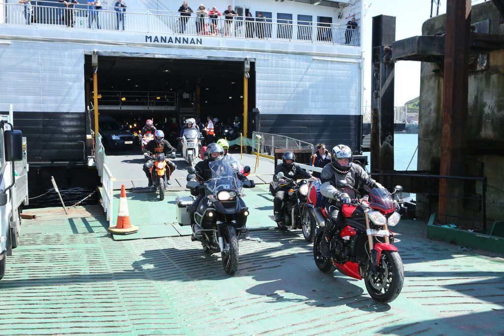 TT Visitors disembarking Steam Packet Company vessel Manannan on motorbikes 