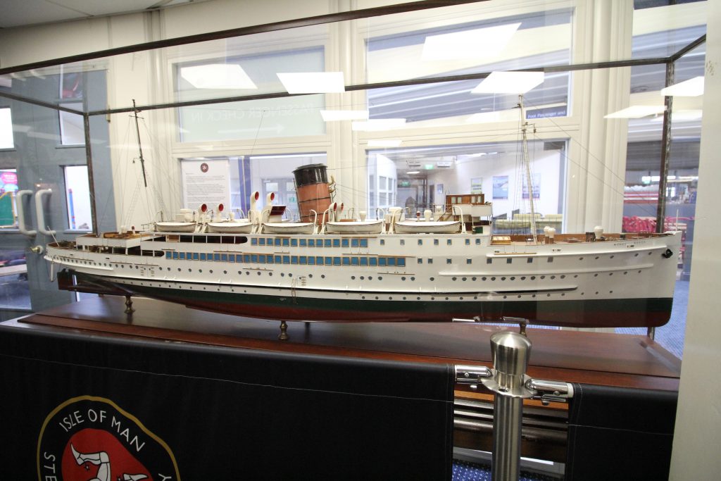 A scale replica of Steam Packet Company vessel Mona's Queen sitting proudly on display at the Ferry Travel Shop in the Sea Terminal, Douglas. ﻿