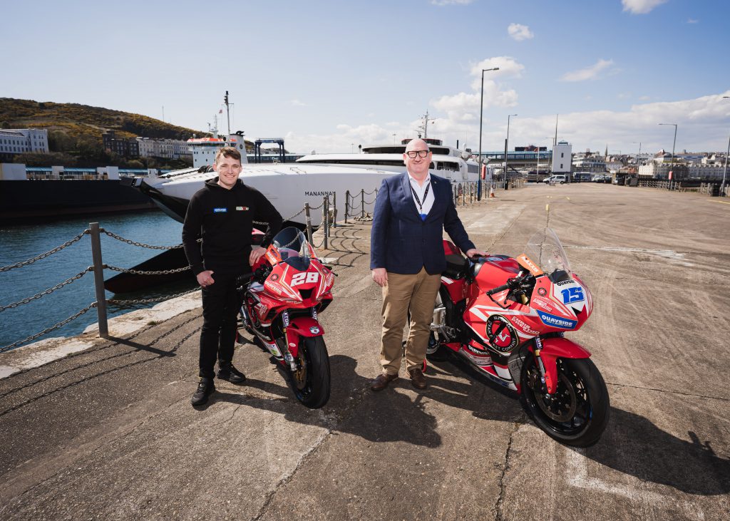 Nathan Harrison and Brian Thomson with motorbikes