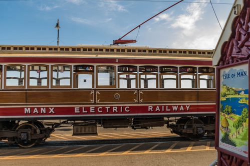 Manx Electric Railway Tram about to depart against a sunny blue sky