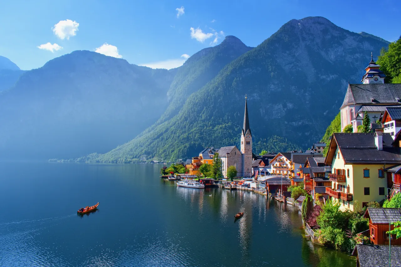 A sunny day in the Austrian Alps overlooking a lake and Hallstatt